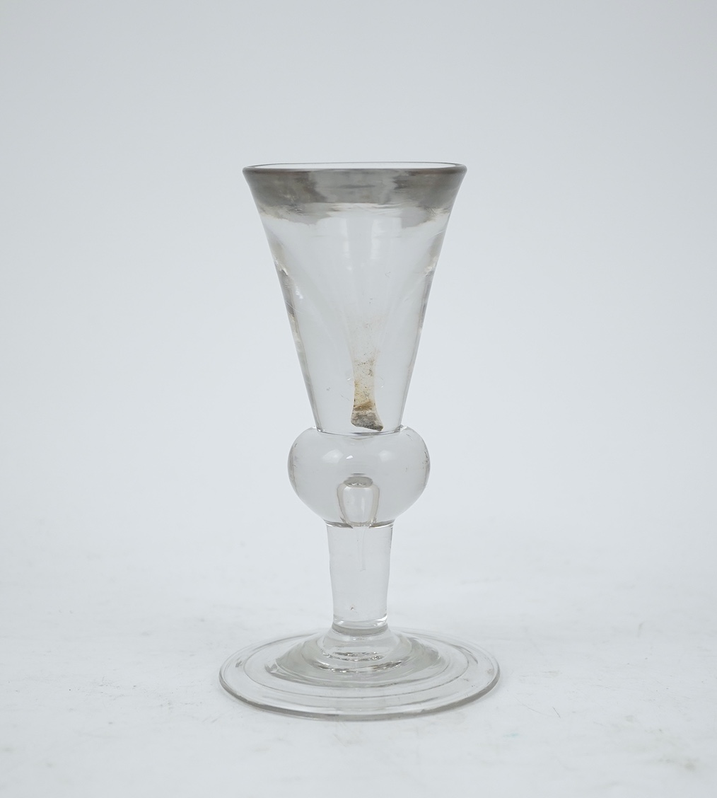 A heavy baluster toastmaster's glass, circa 1715-1720